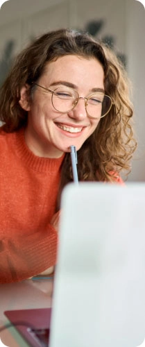 Image of a software engineer behind a laptop